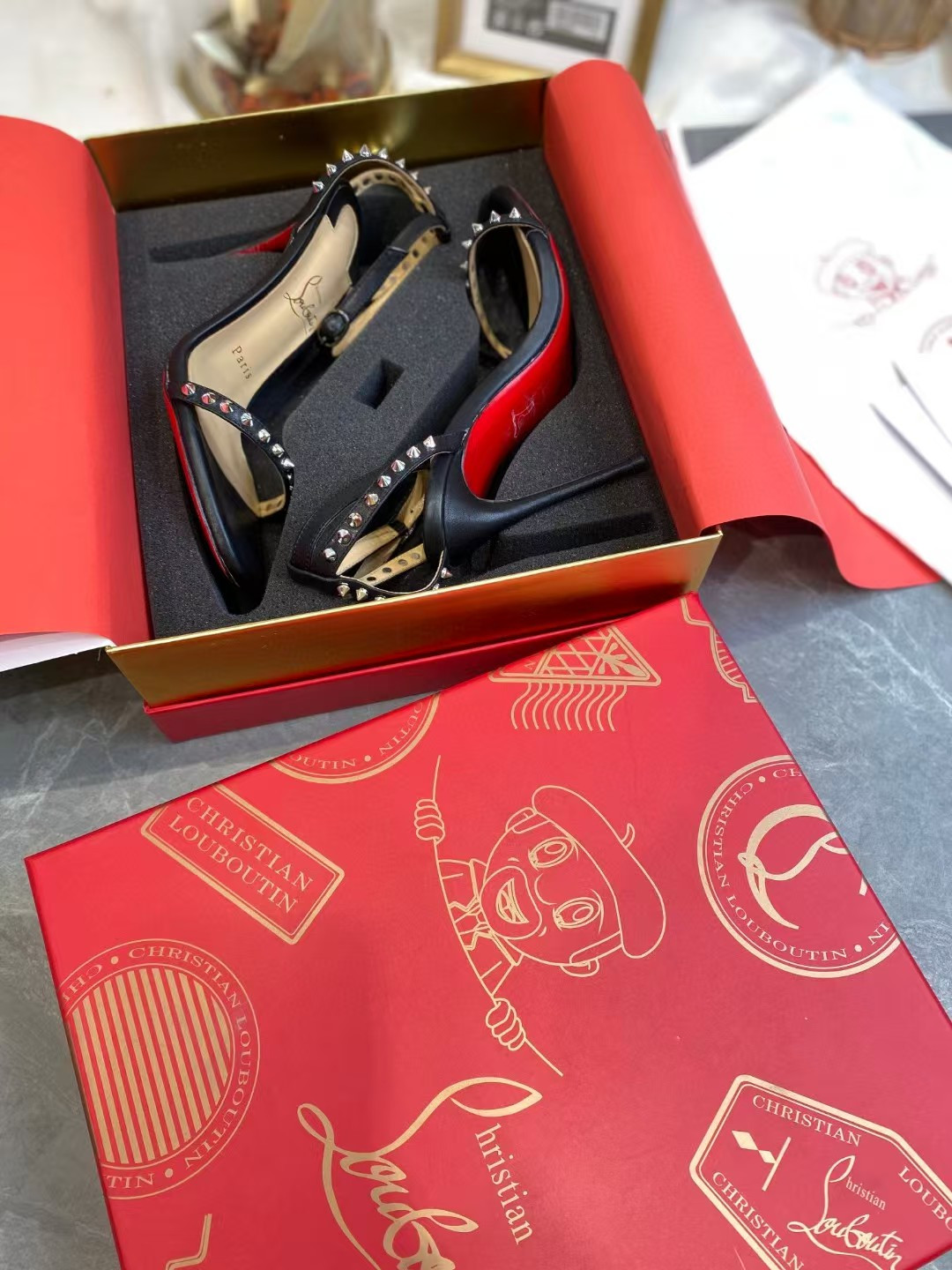 UA Ch**an Louboutin So Me Spike Strappy Sandals