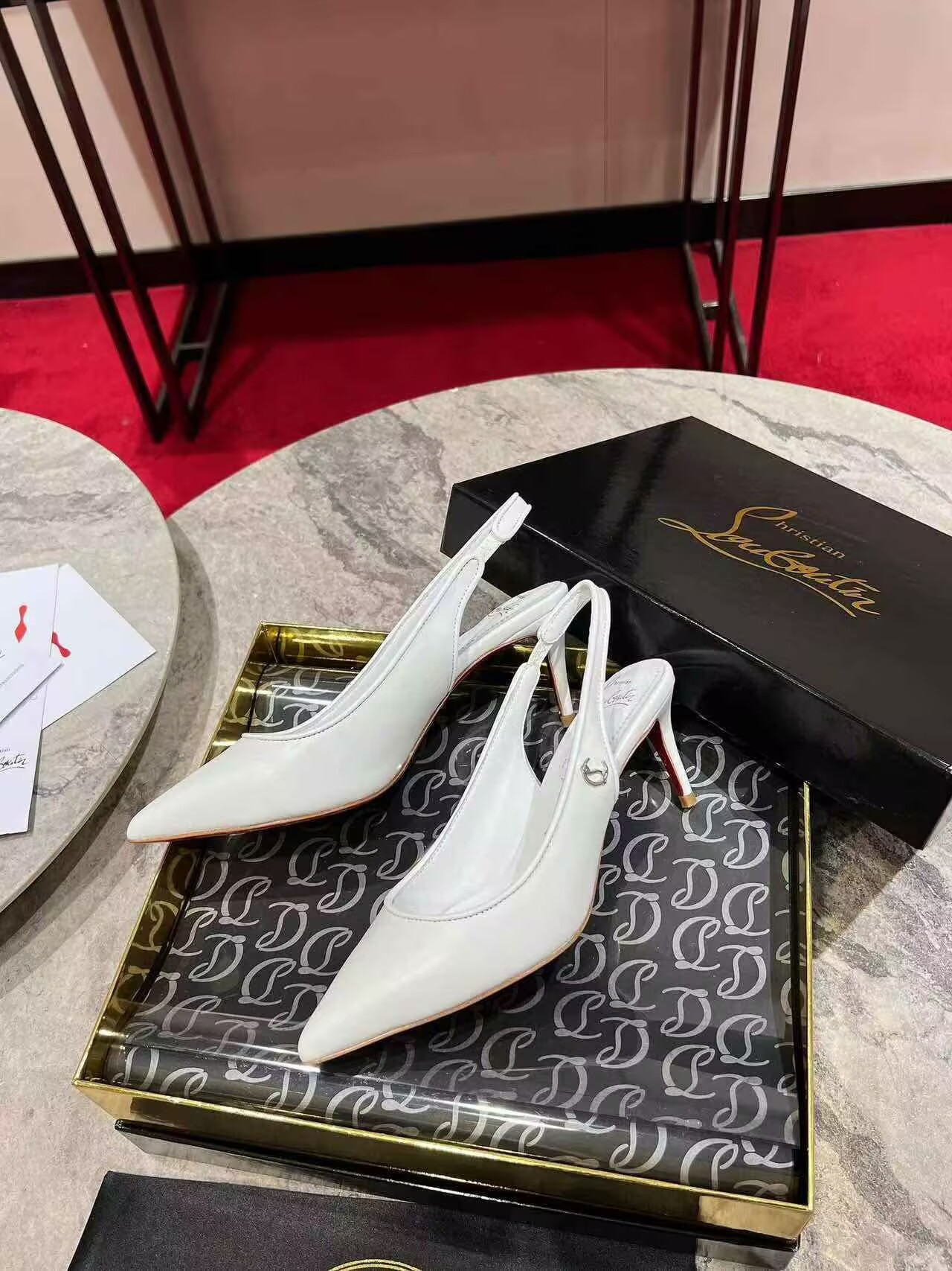 UA Ch**an Louboutin Sporty Kate Sling 65mm