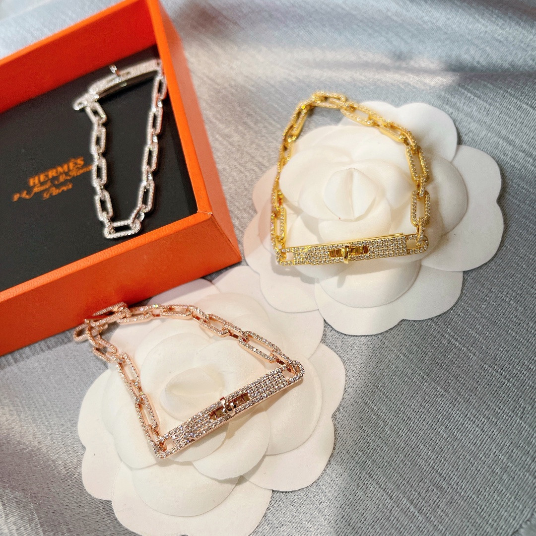 hermès fully Di*m*nd-encrusted kelly bracelet