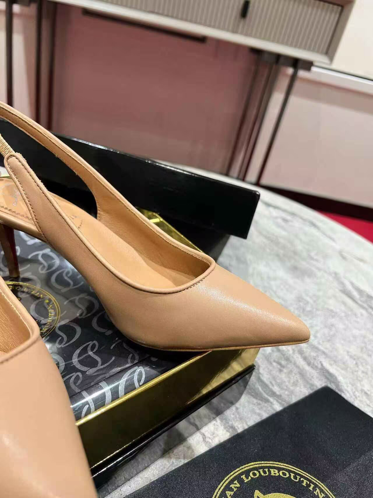 UA Ch**an Louboutin Sporty Kate Sling 65mm