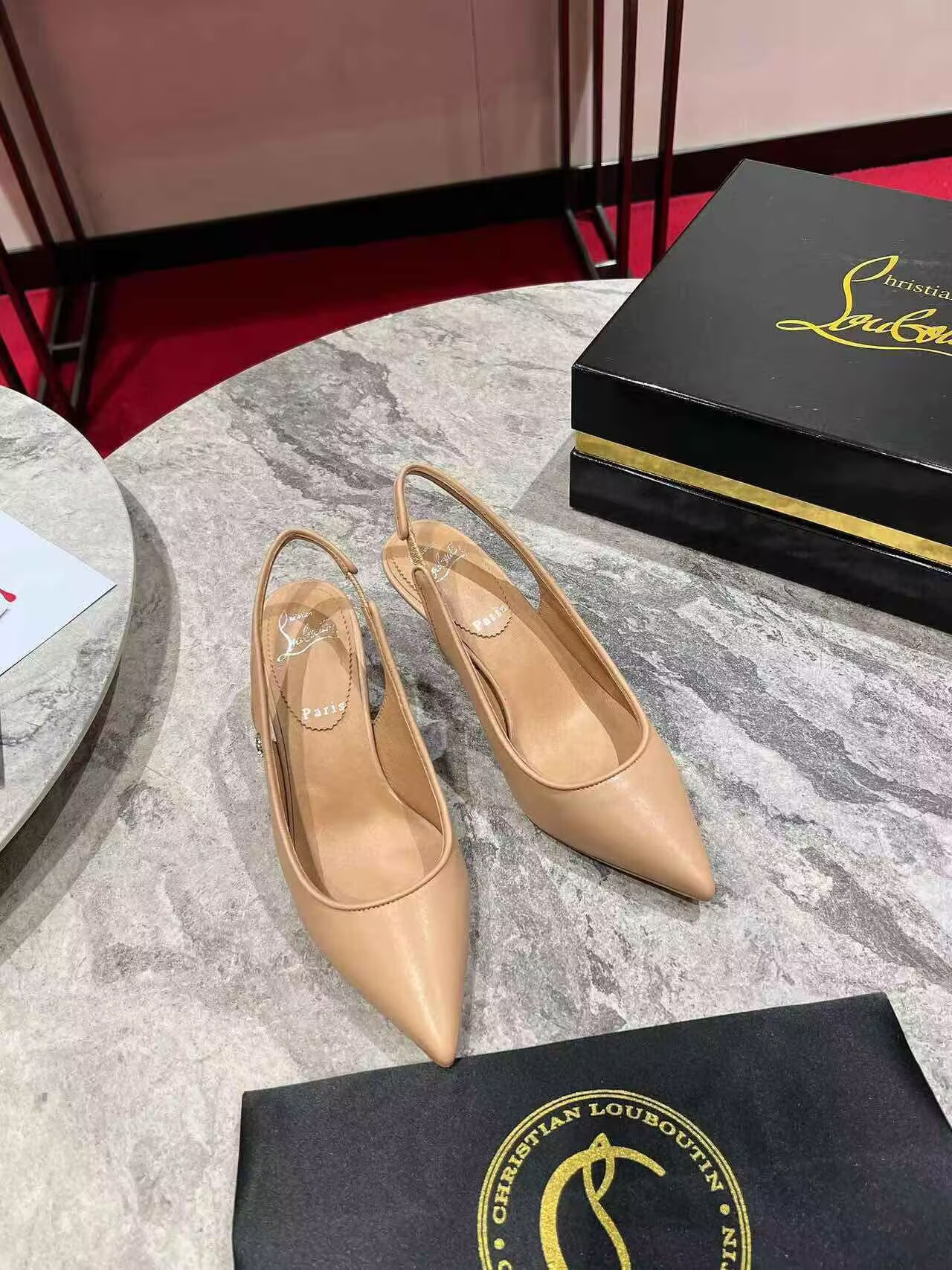 UA Ch**an Louboutin Sporty Kate Sling 65mm