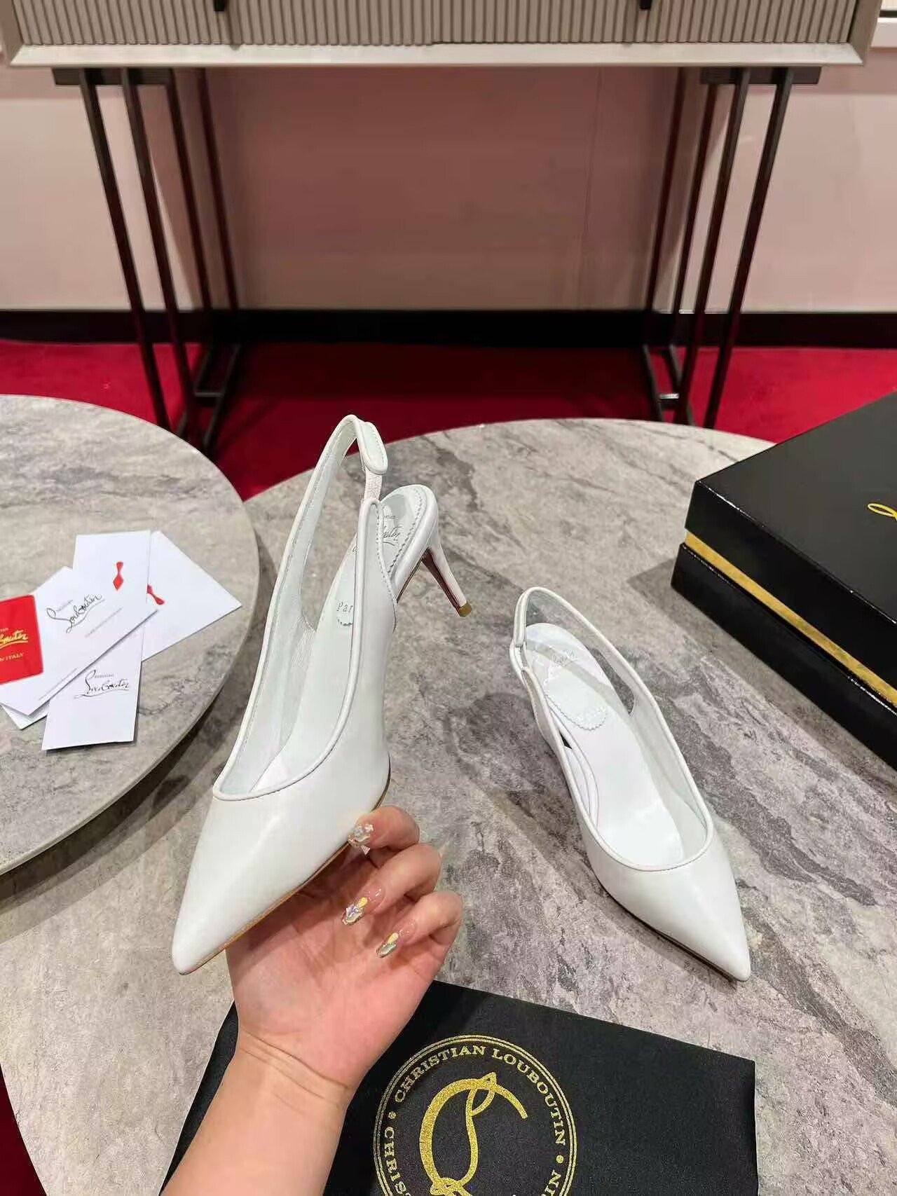 UA Ch**an Louboutin Sporty Kate Sling 65mm