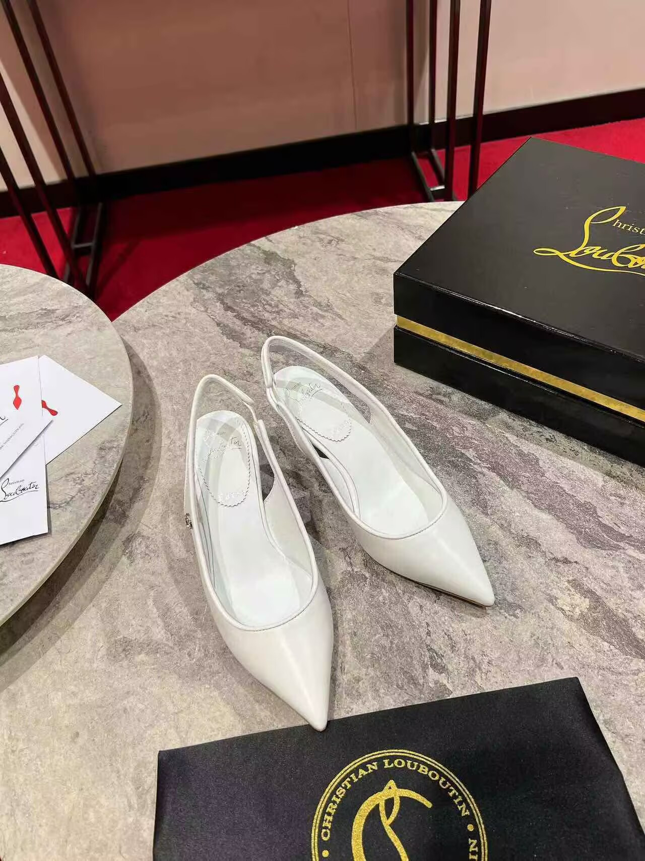 UA Ch**an Louboutin Sporty Kate Sling 65mm