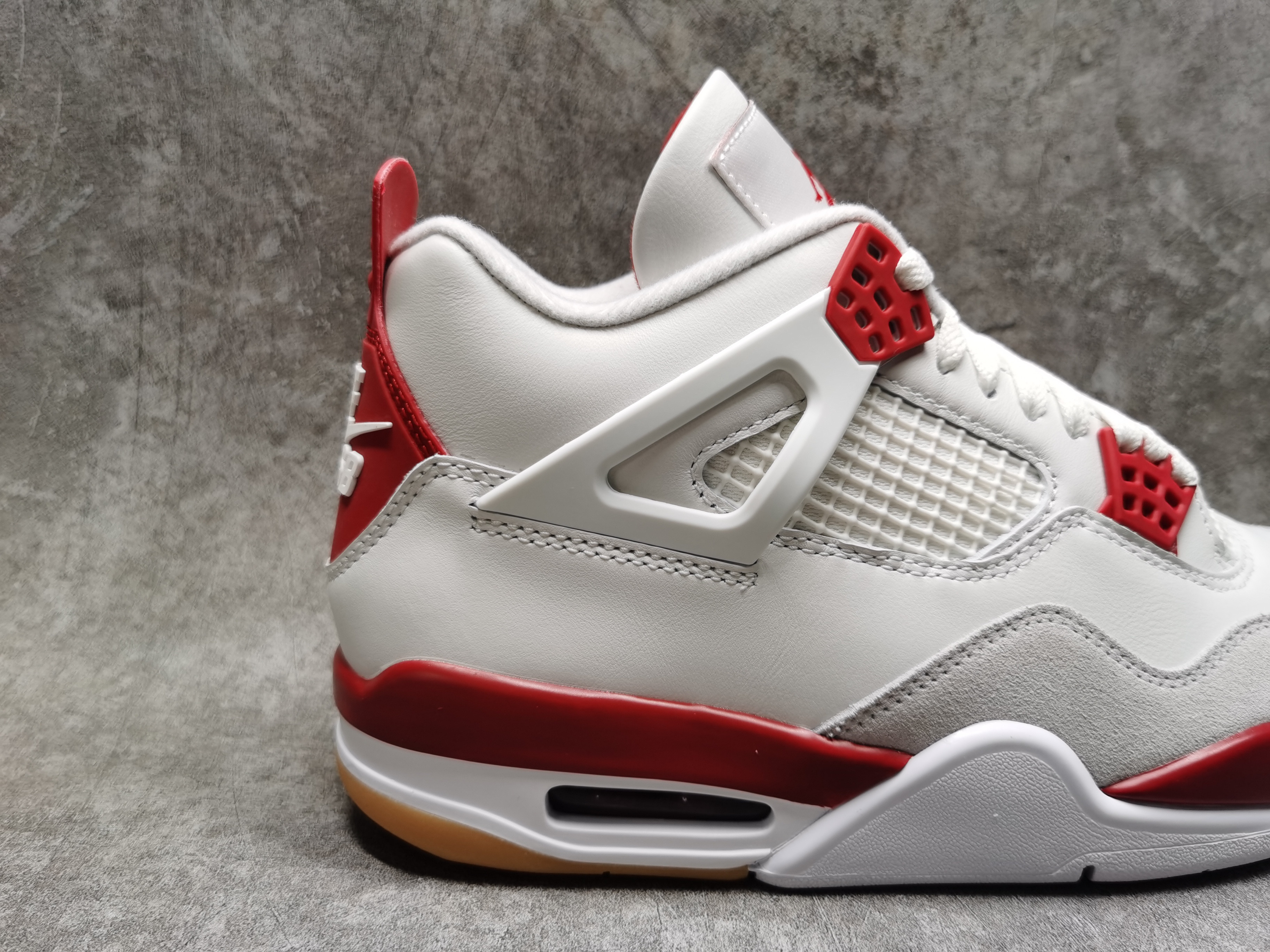 UA Jordan 4 Retro SB