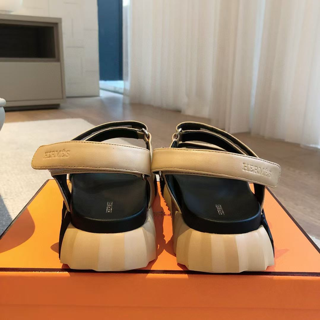 UA H**mes Junior sandal