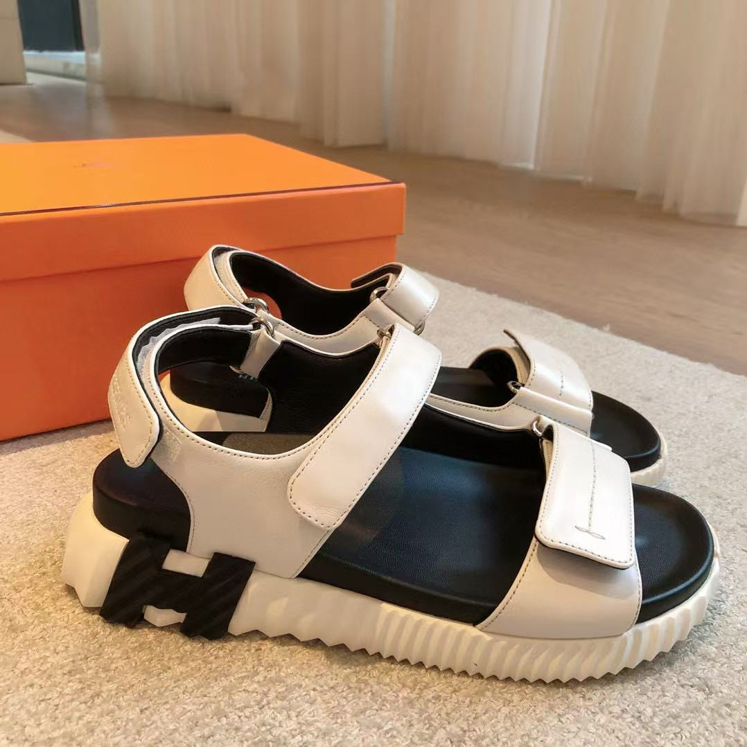 UA H**mes Junior sandal