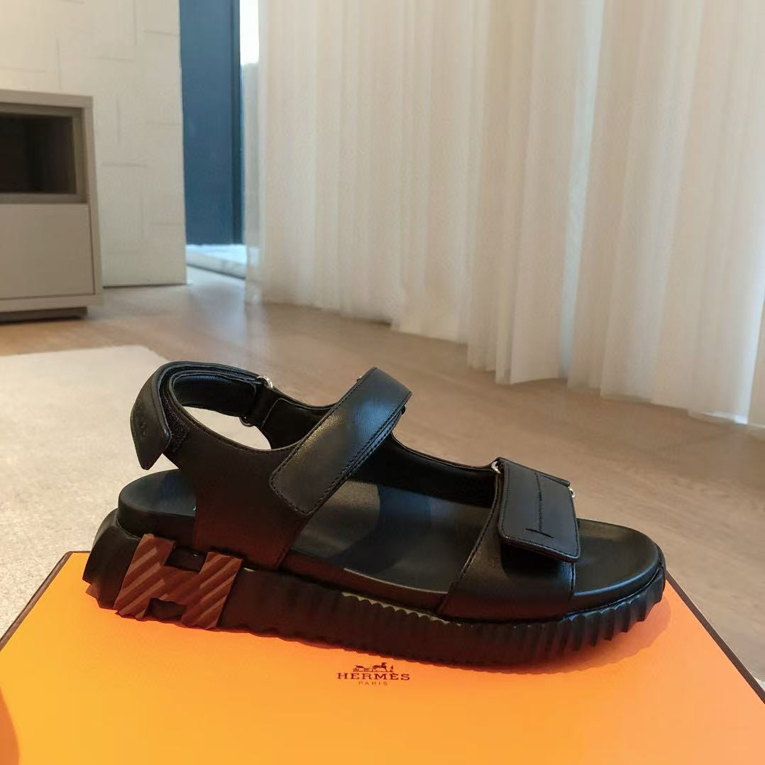UA H**mes Junior sandal