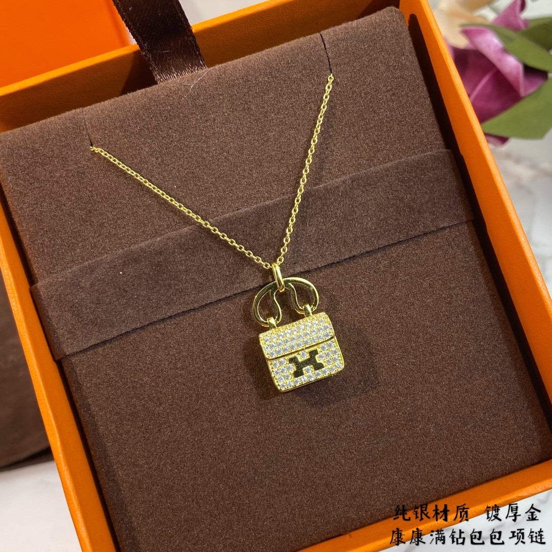 hermès fully Di*m*nd-encrusted h bag necklace