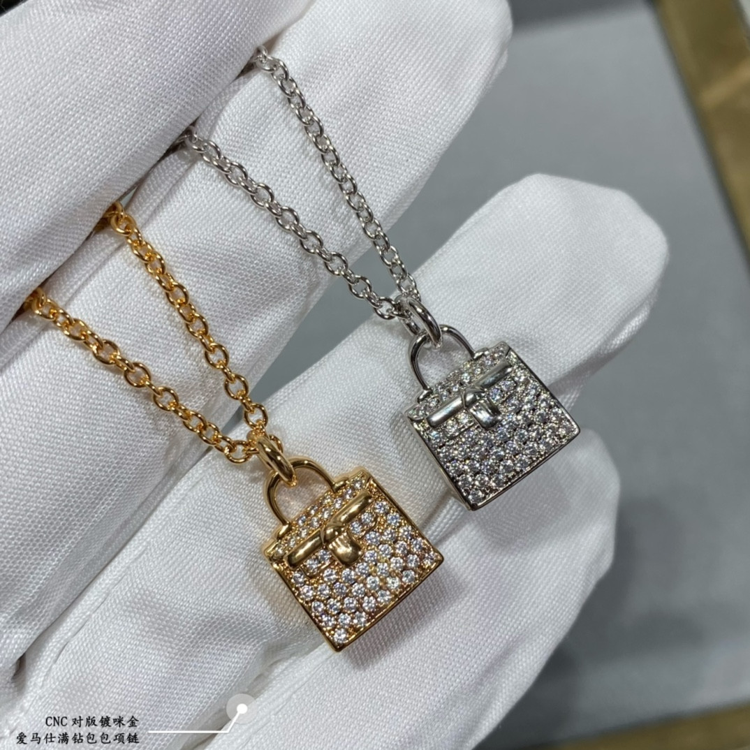 hermès fully Di*m*nd-encrusted bag necklace