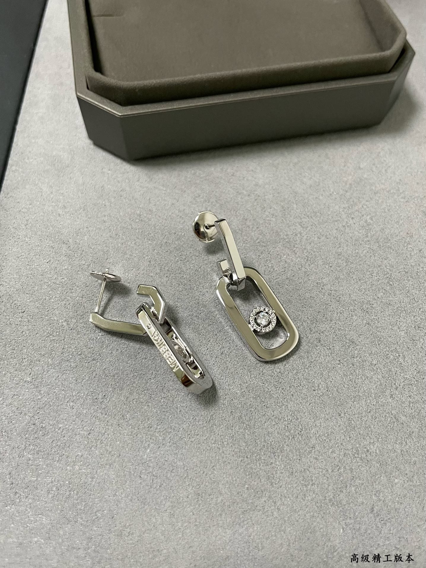 messika large single Di*m*nd moving stud earrings