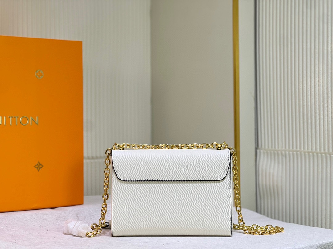 L0*is V*t0n Twist MM white 9.1 x 6.7 x 3.7 inches