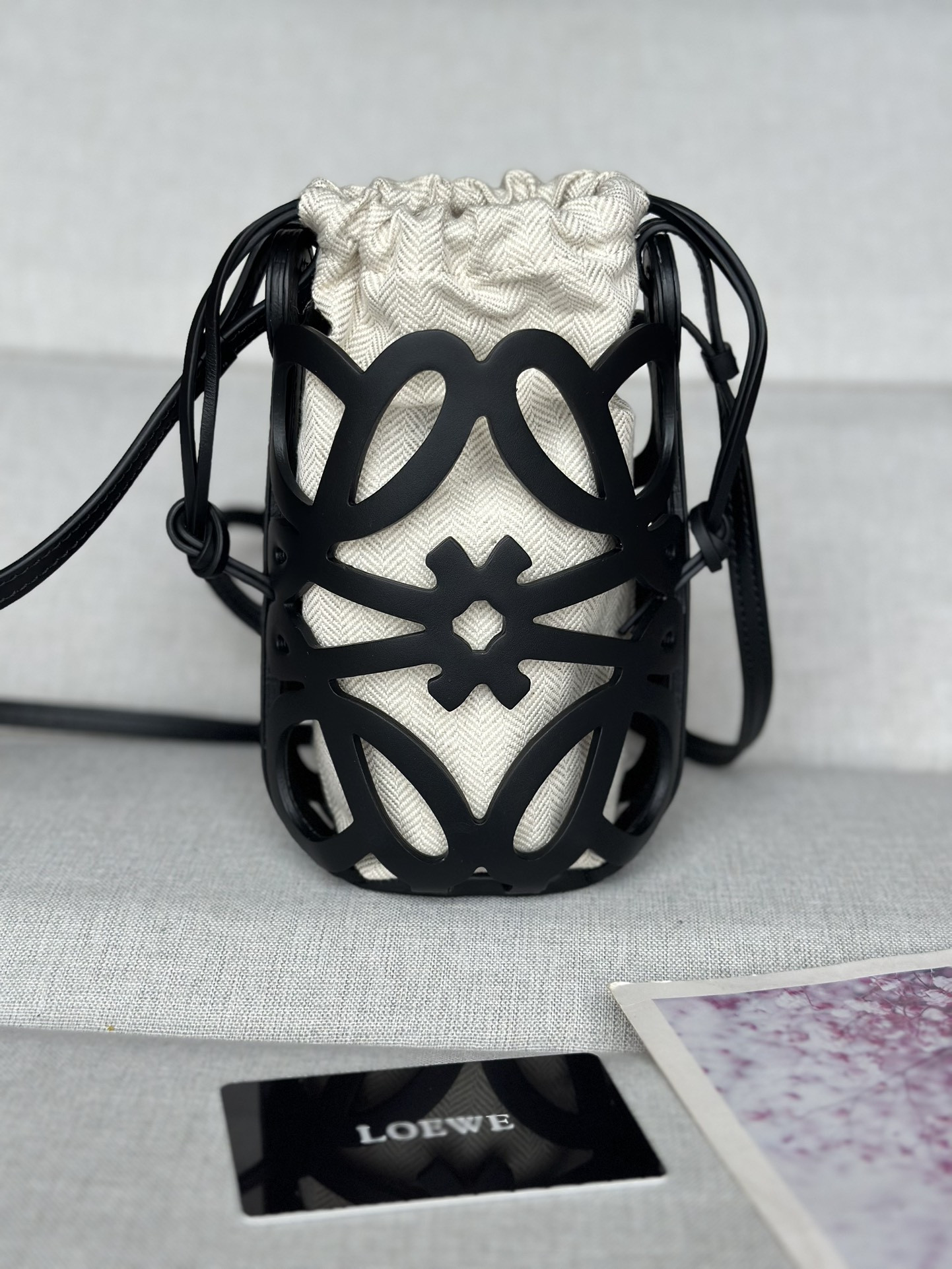 L0ew* Anagram cut-out pocket in classic calfskin and canvas 20x11x8cm