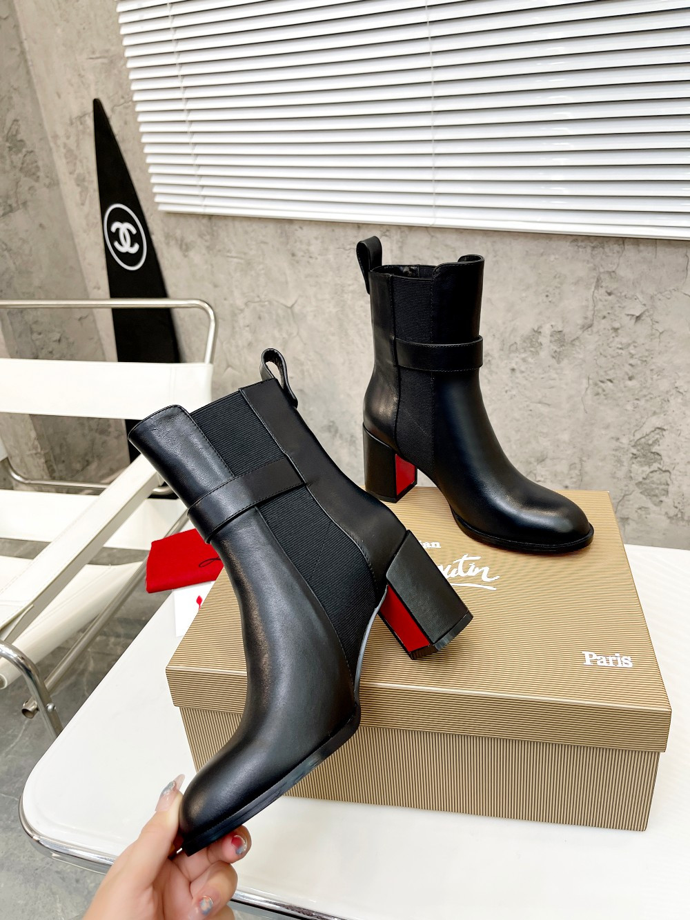 UA Ch**an Louboutin (CL) launched a new collection of chunky heeled platform boots