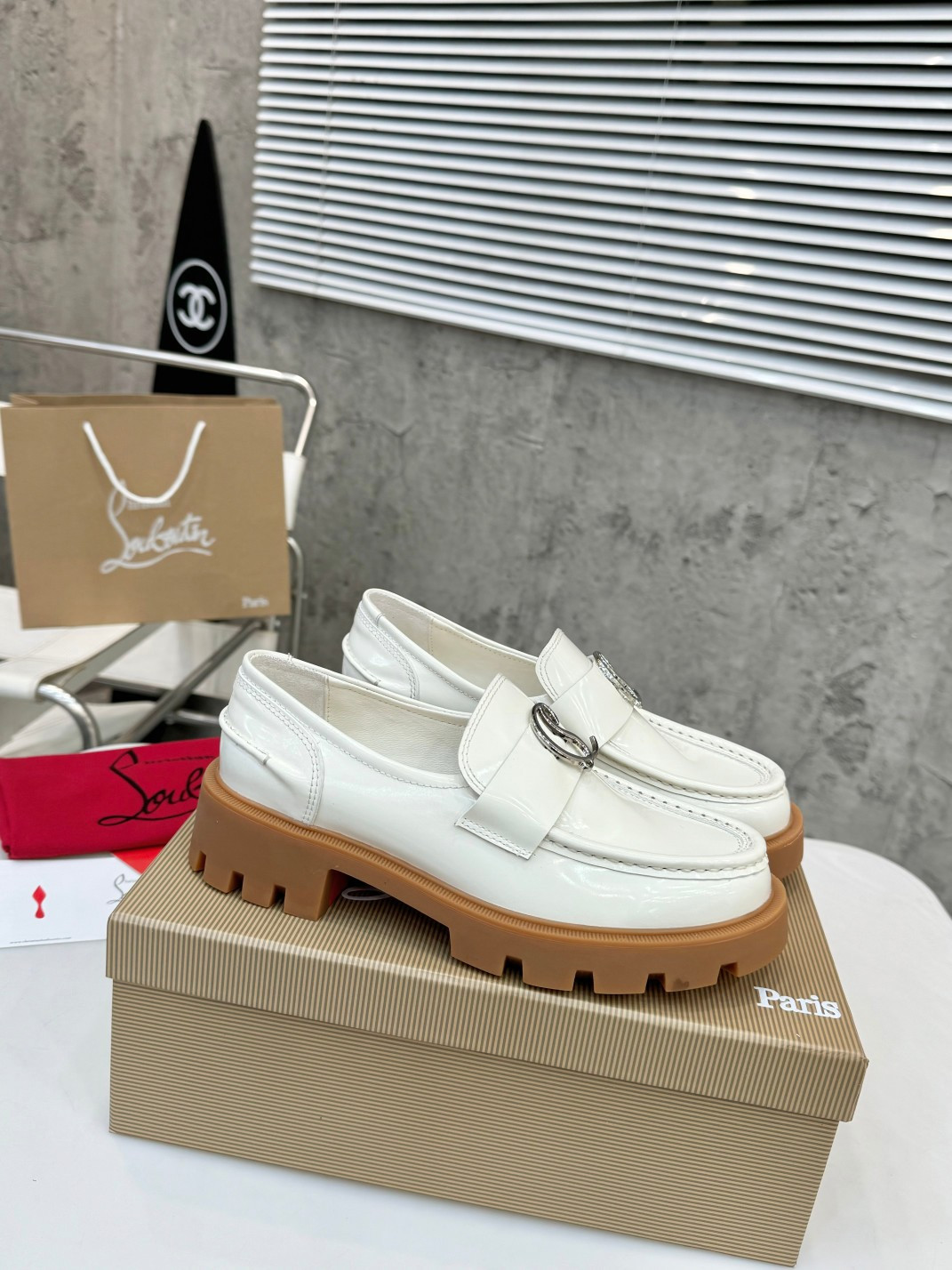 UA Ch**an Louboutin(CL) logo design,the latest runway version of the red-soled shoes