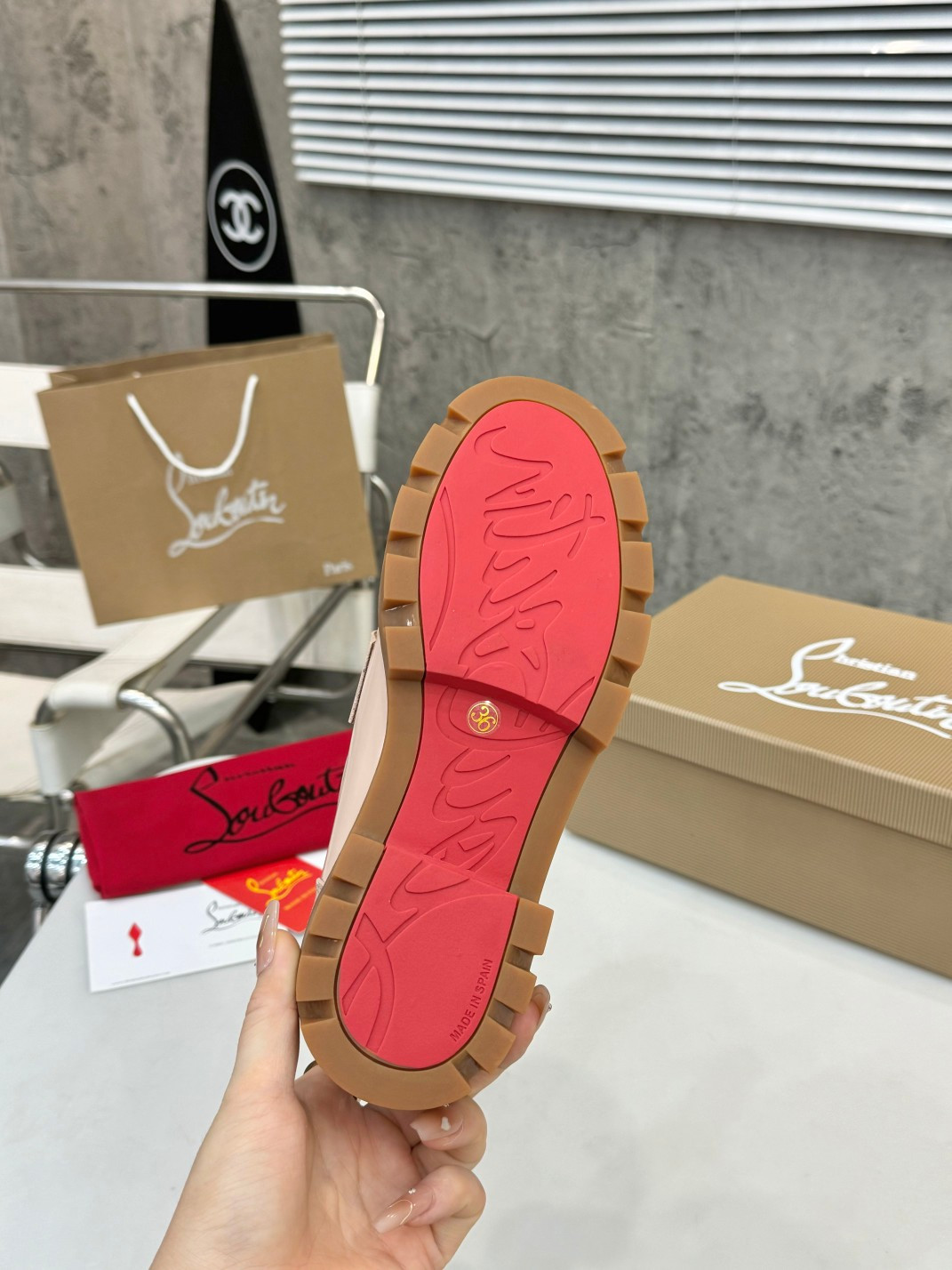 UA Ch**an Louboutin(CL) logo design,the latest runway version of the red-soled shoes