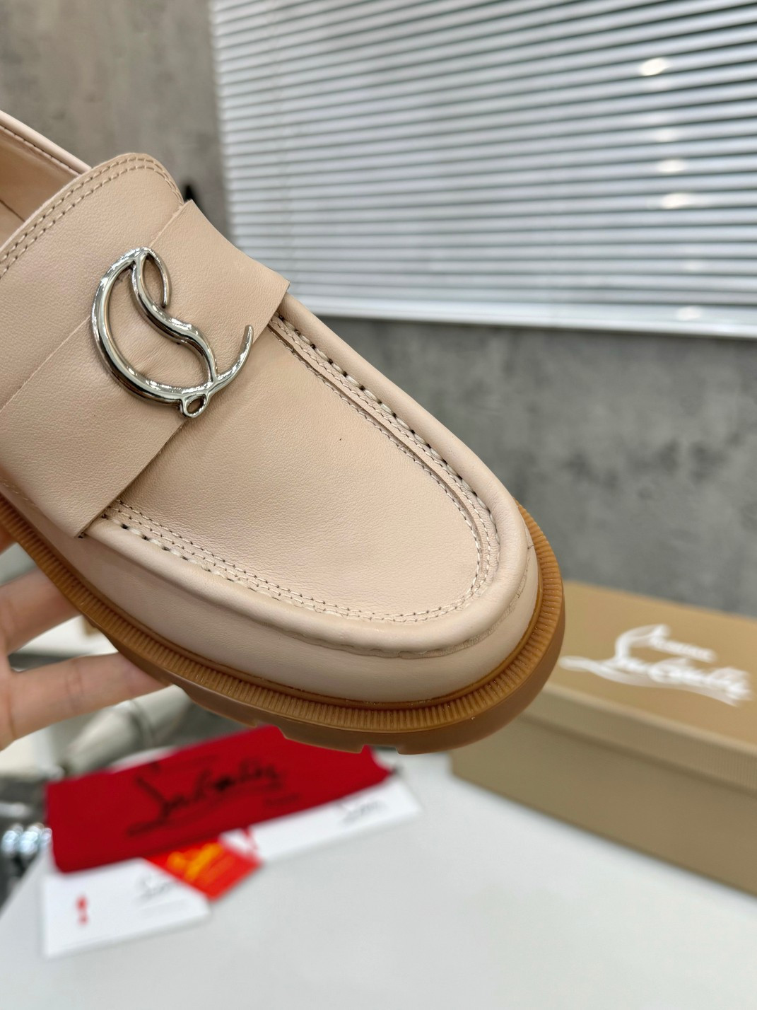 UA Ch**an Louboutin(CL) logo design,the latest runway version of the red-soled shoes